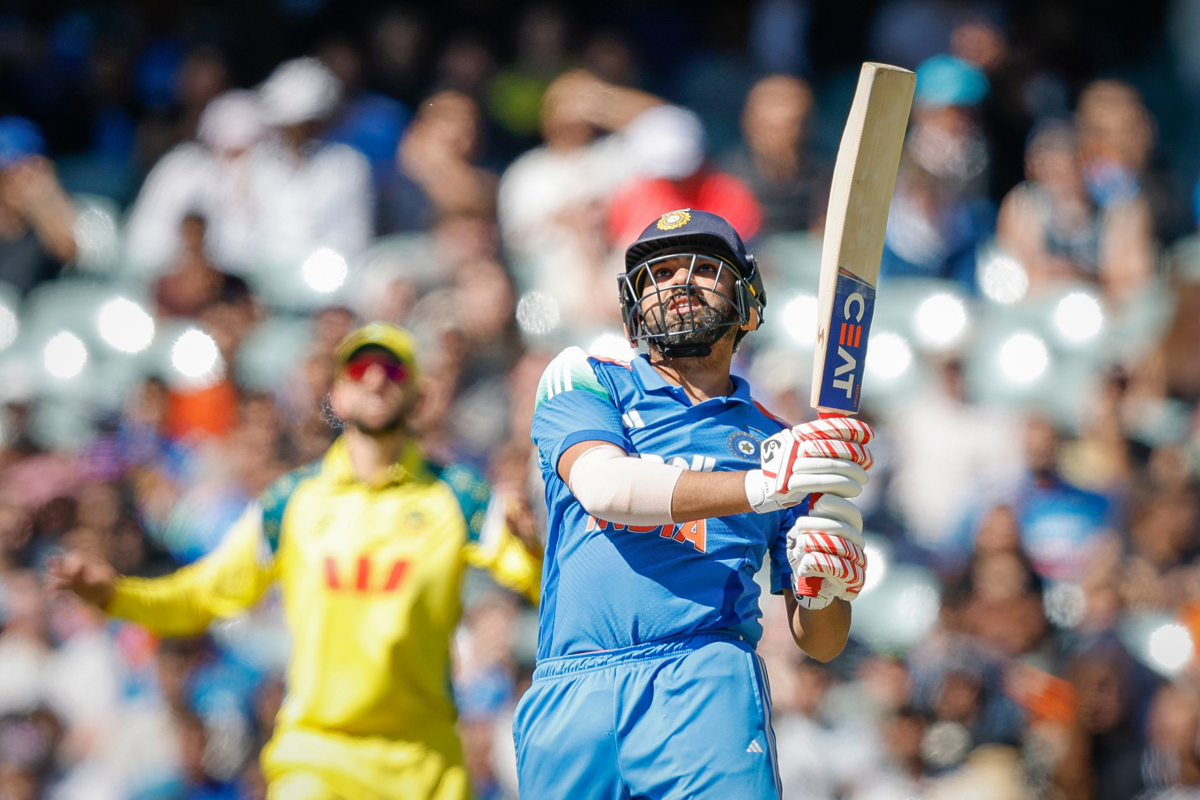 Rohit Sharma scores 73; India posts 264 for 9 against Australia in crucial match.