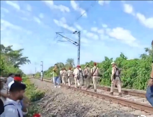 Assam IED blast on railway track halts train services, causing significant disruptions.